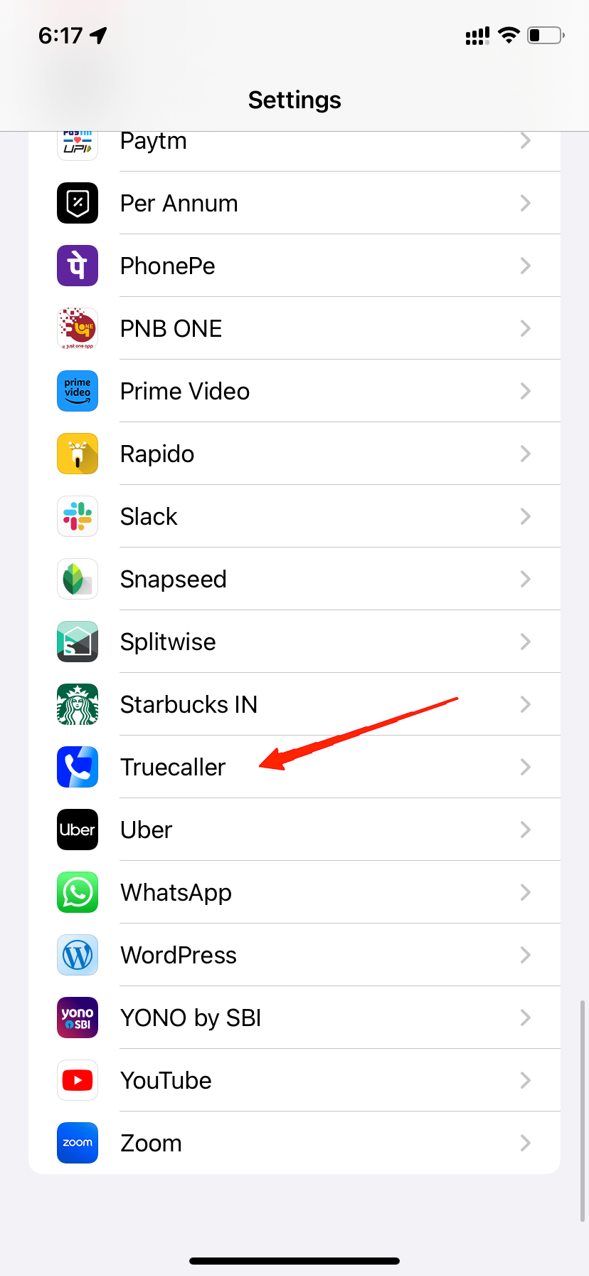 iPhoneの設定アプリを開き、Truecallerオプションに移動します。