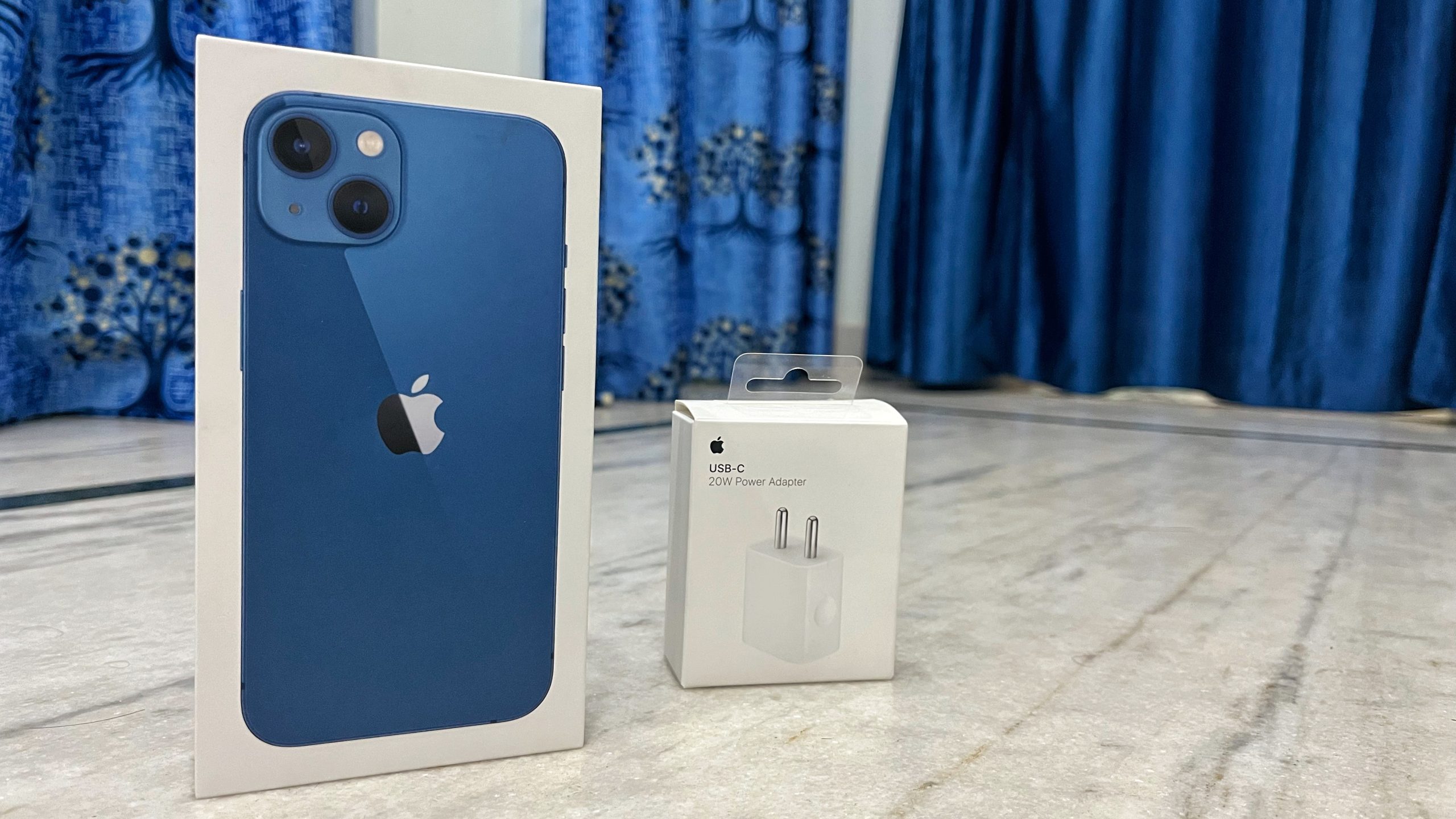 iPhone 13 and power adapter